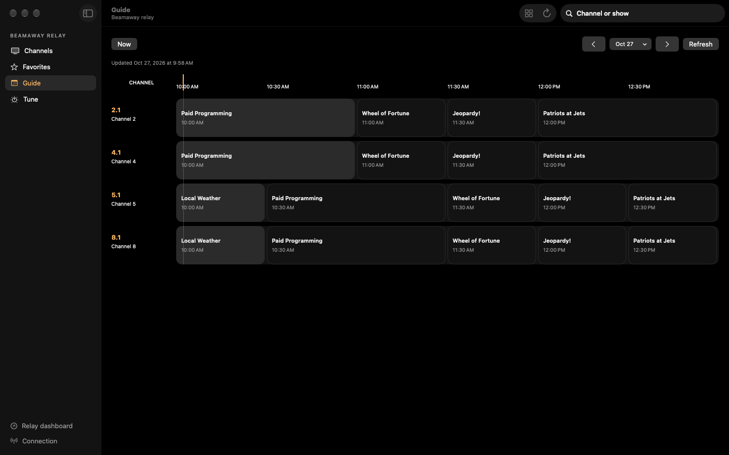 The program guide in Beamaway for Mac: four channels across the next three hours, with a line at the current time.